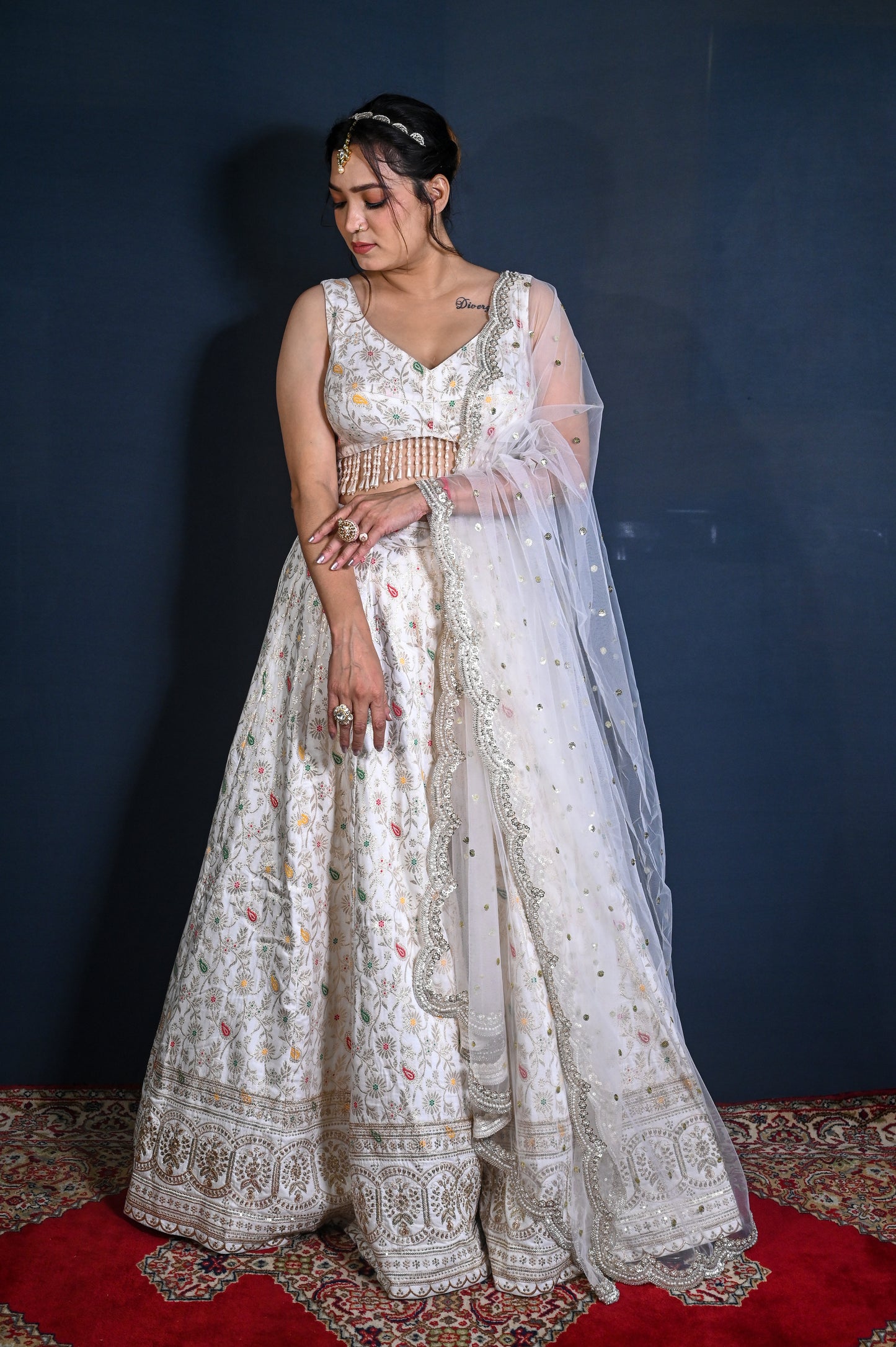 Dola silk Banarasi Lehenga set with hand embroidered net dupatta