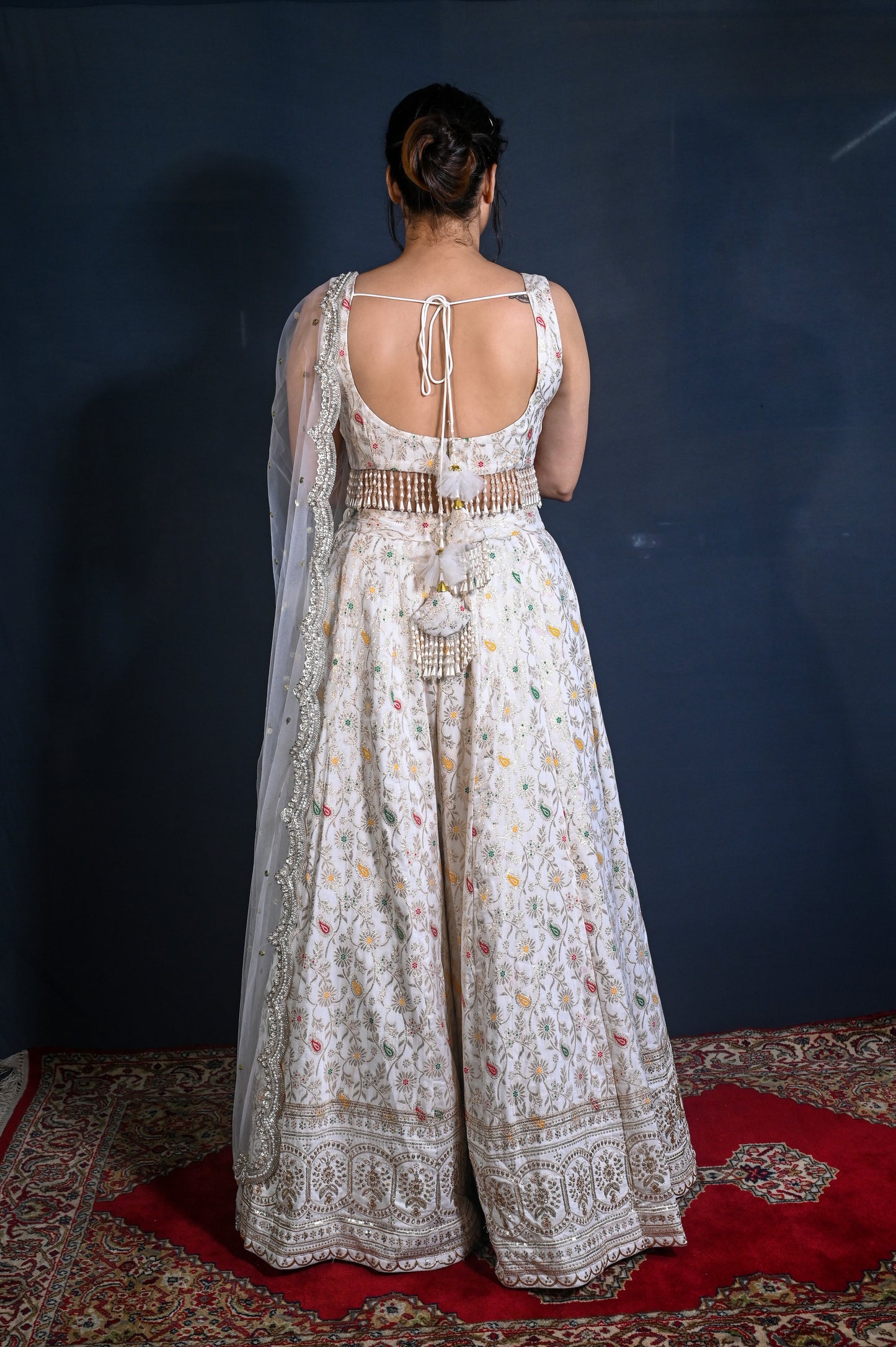 Dola silk Banarasi Lehenga set with hand embroidered net dupatta