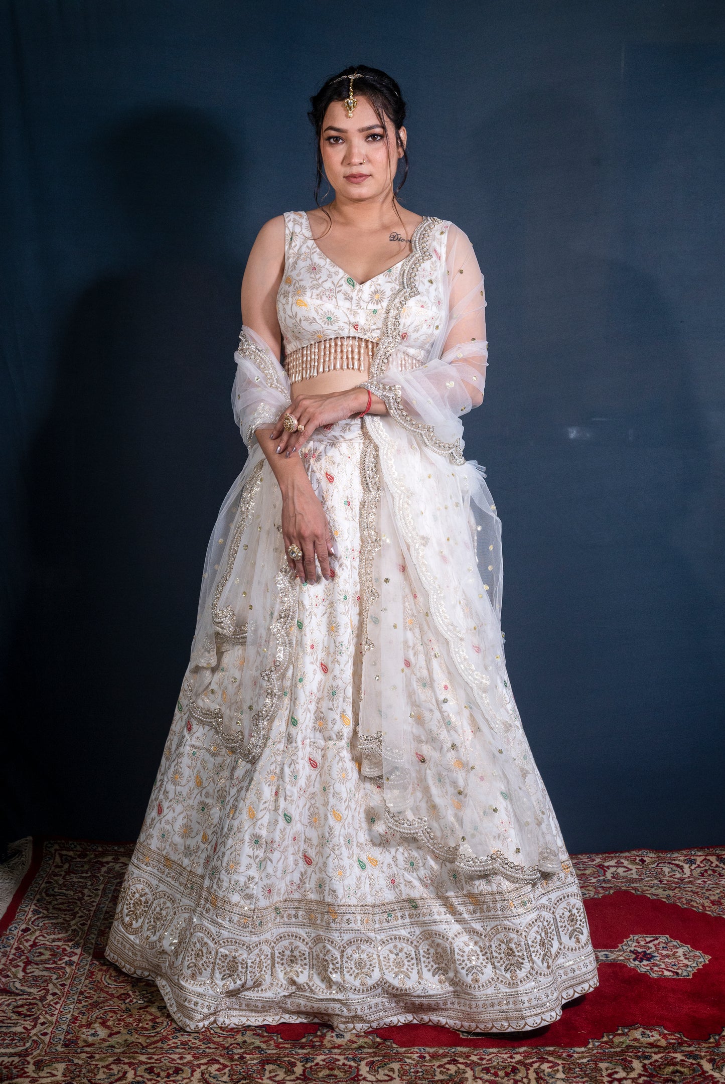 Dola silk Banarasi Lehenga set with hand embroidered net dupatta