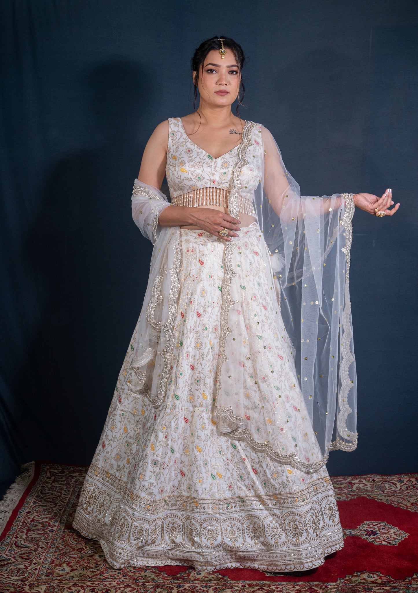 Dola silk Banarasi Lehenga set with hand embroidered net dupatta