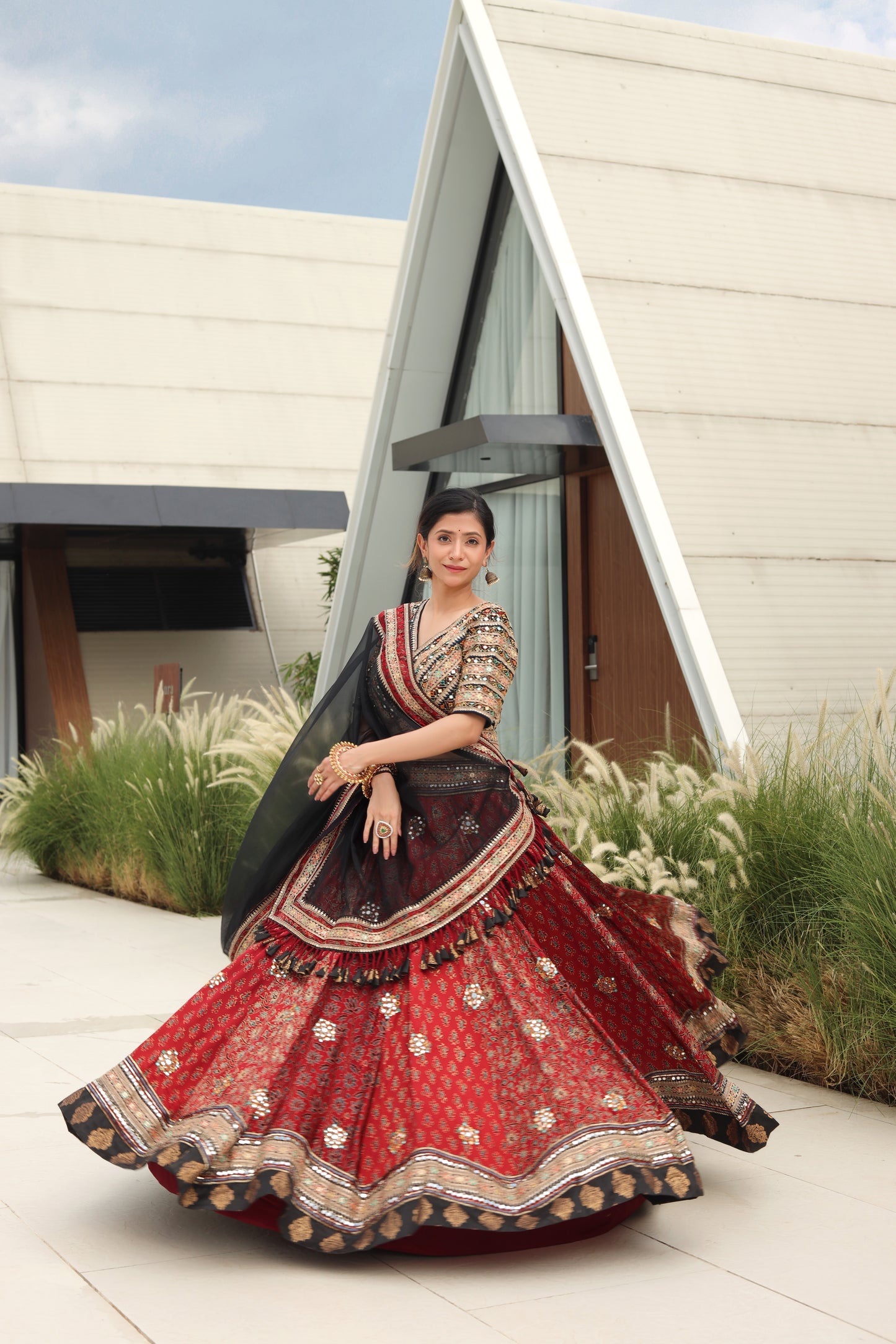 Hand Block Printed Ajrakh Lehenga with Aari Embroidery