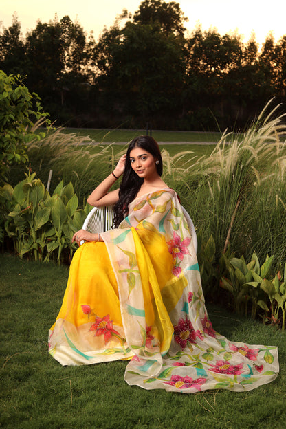 Radiant Yellow Hand-Painted Silk Saree with Floral Motifs