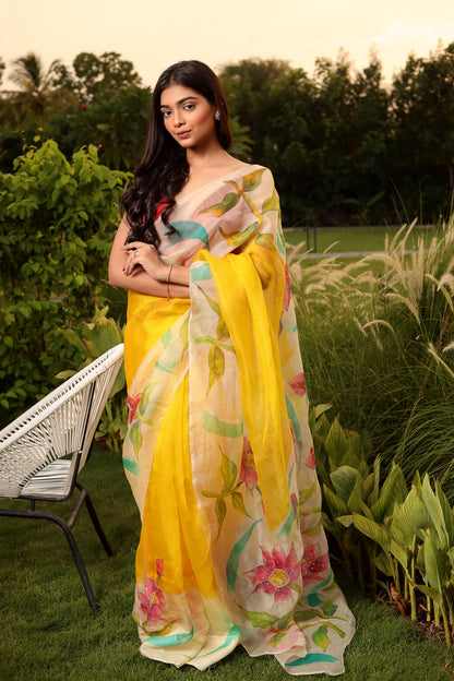 Radiant Yellow Hand-Painted Silk Saree with Floral Motifs