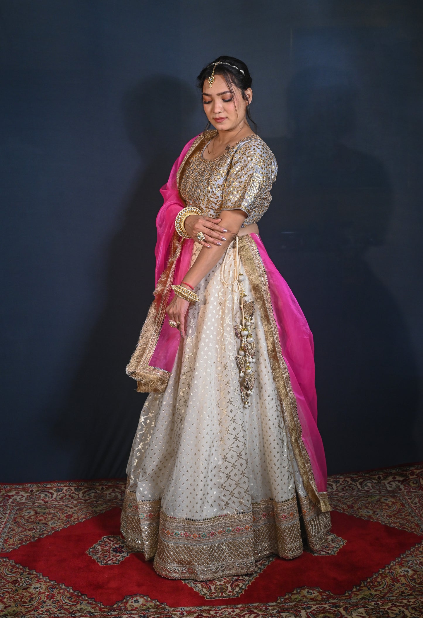 Banarasi Chanderi Lehenga with hand embroidered Gotapatti blouse and Fuchsia organza dupatta