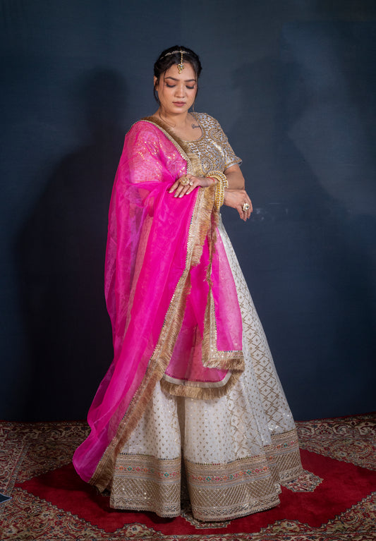 Banarasi Chanderi Lehenga with hand embroidered Gotapatti blouse and Fuchsia organza dupatta