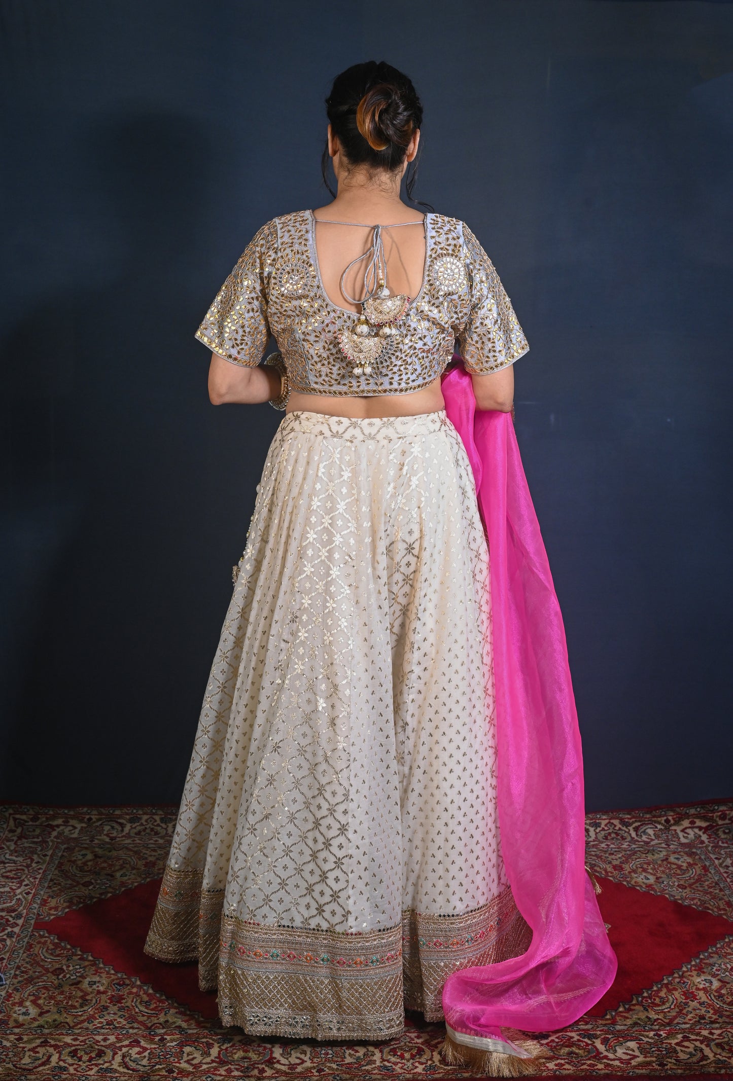 Banarasi Chanderi Lehenga with hand embroidered Gotapatti blouse and Fuchsia organza dupatta